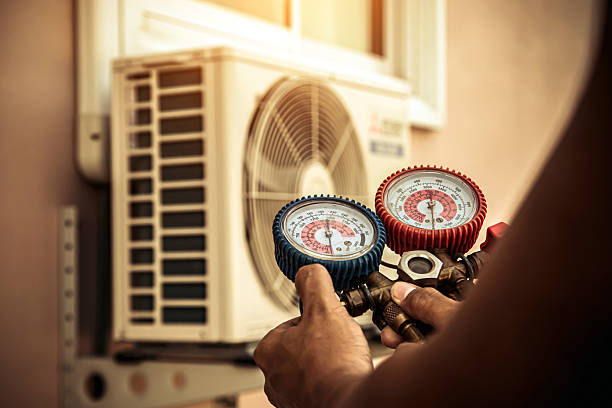 Professional Air Conditioning Service technician working in Burgaw, NC